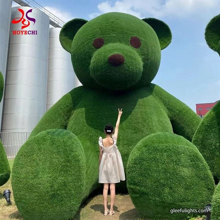 Innovative Garden Decor: The Perfect Blend Of Giant Bear And Artificial Plants